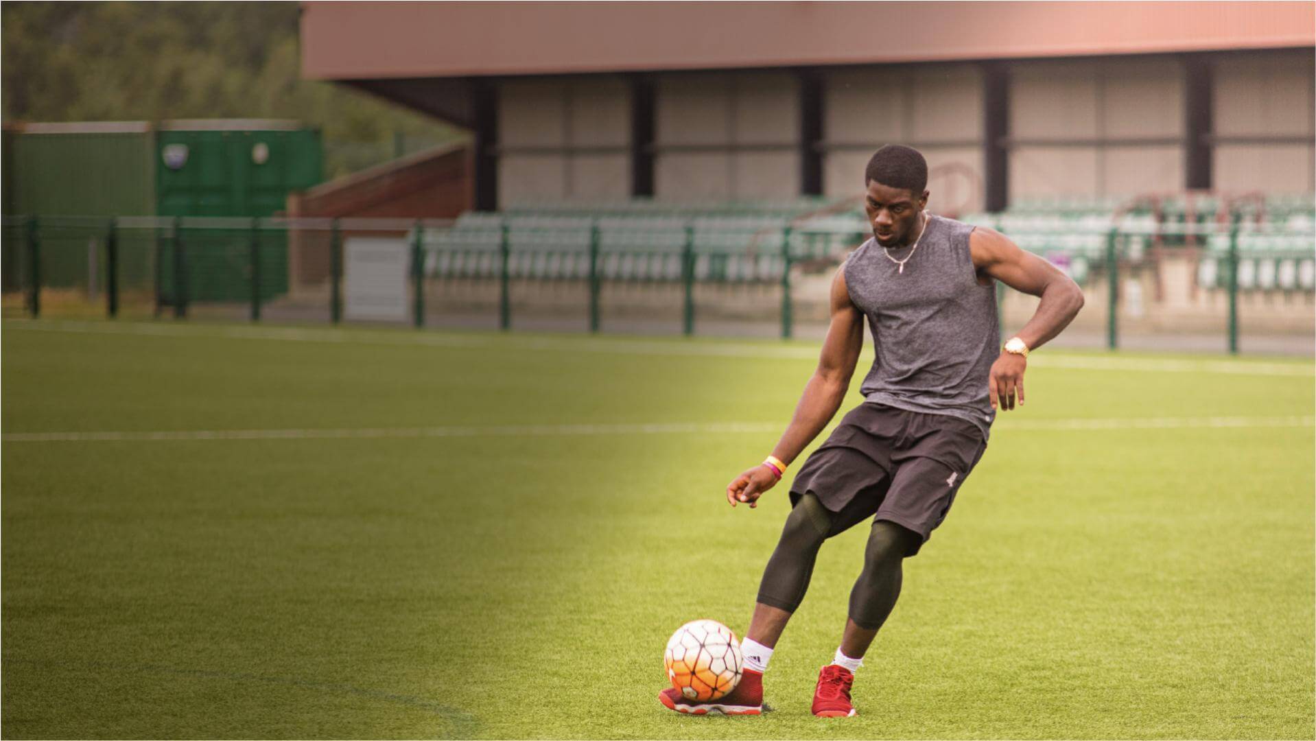 Male playing football getting ready to kick the ball