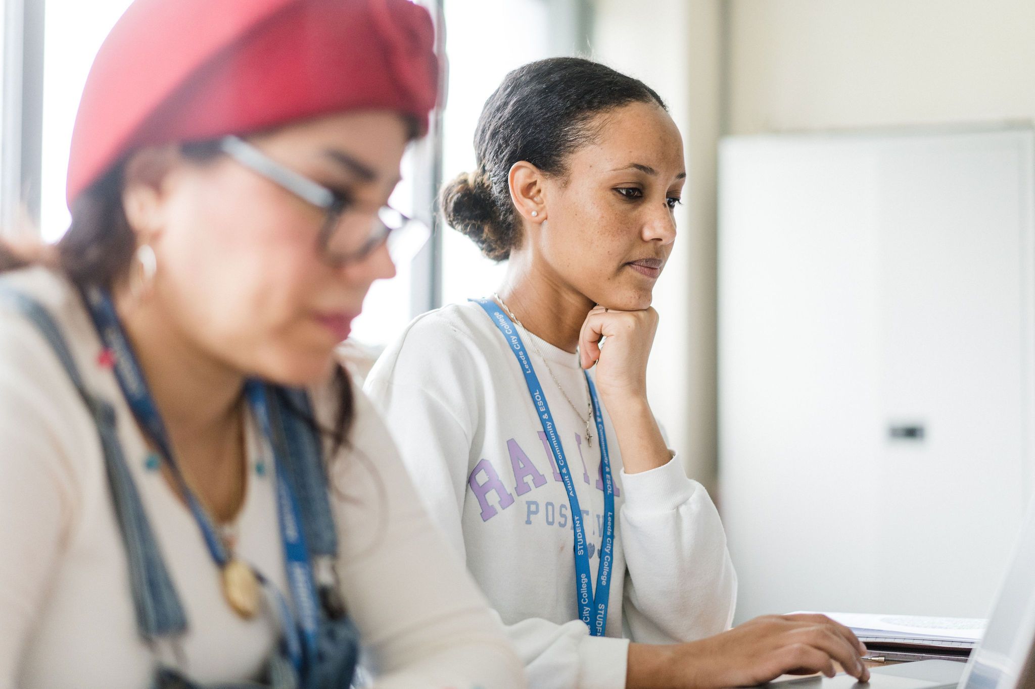 Two adult learners in Deacon house in class