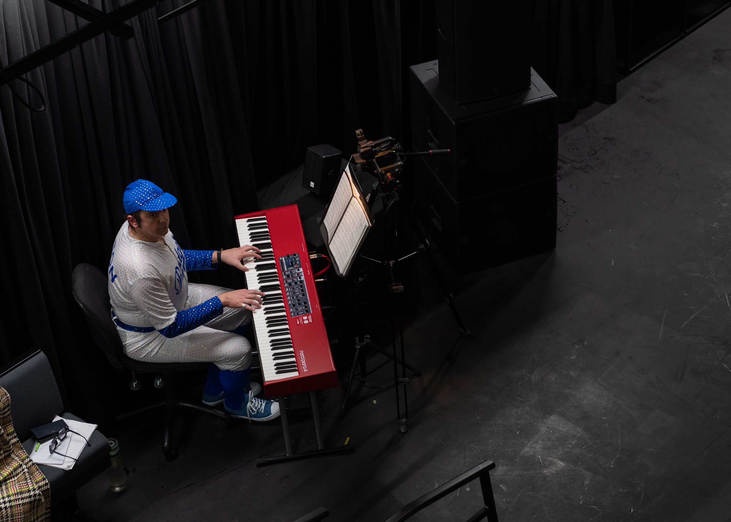 LCC Creative arts Music performance with a male student playing the piano for a musical theatre performance