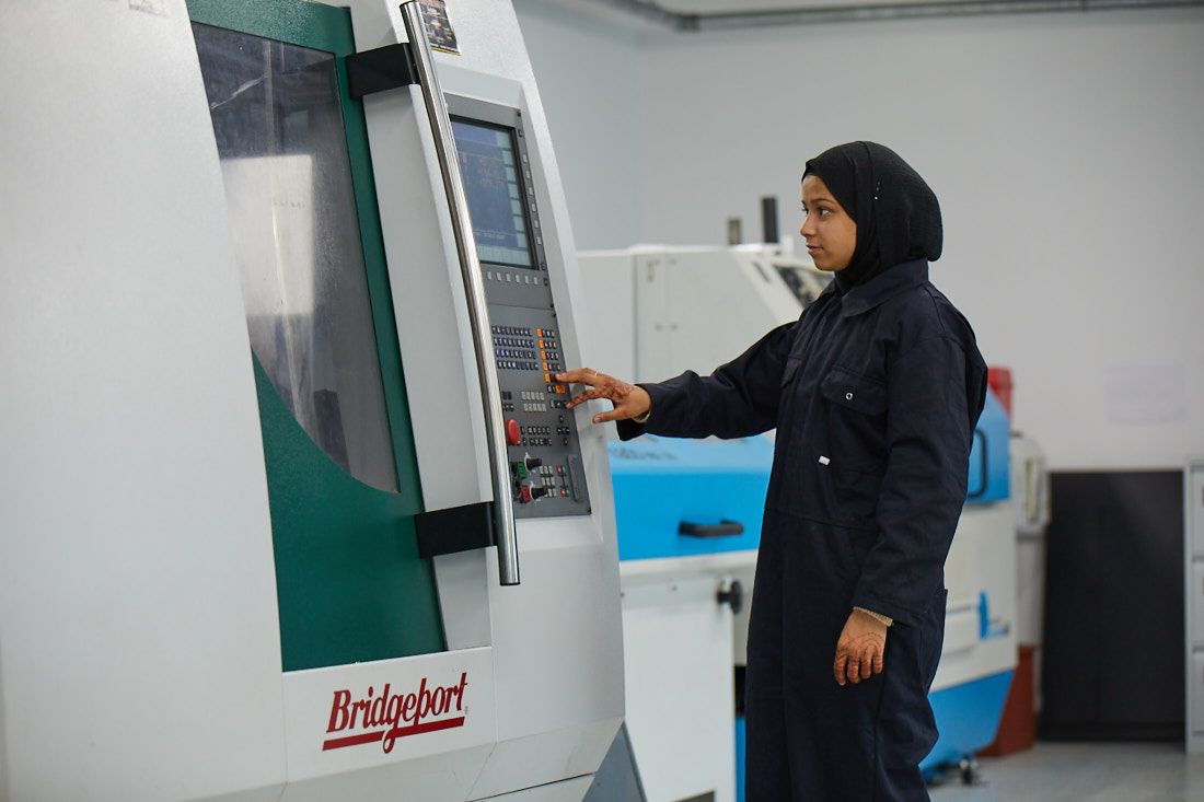 Engineering student at Leeds City College using a machine