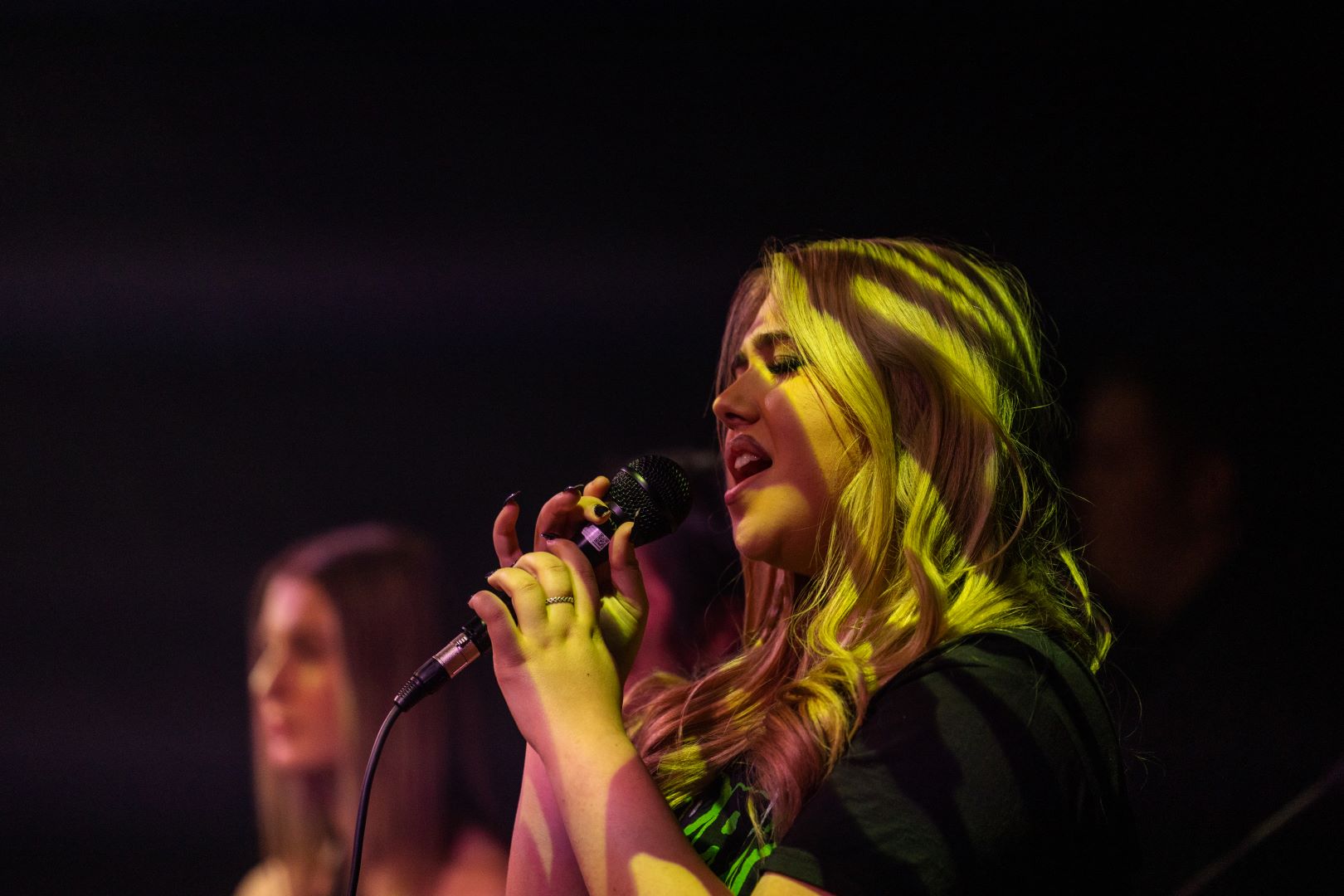 Female singers performing at a show