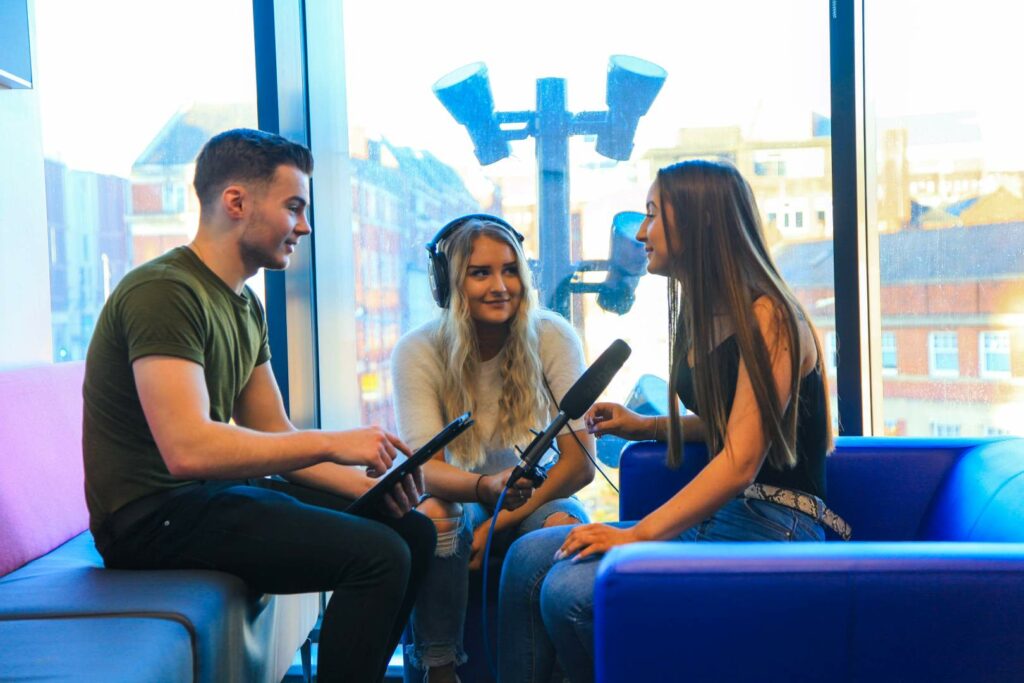 Journalism Students doing a radio interview with another student