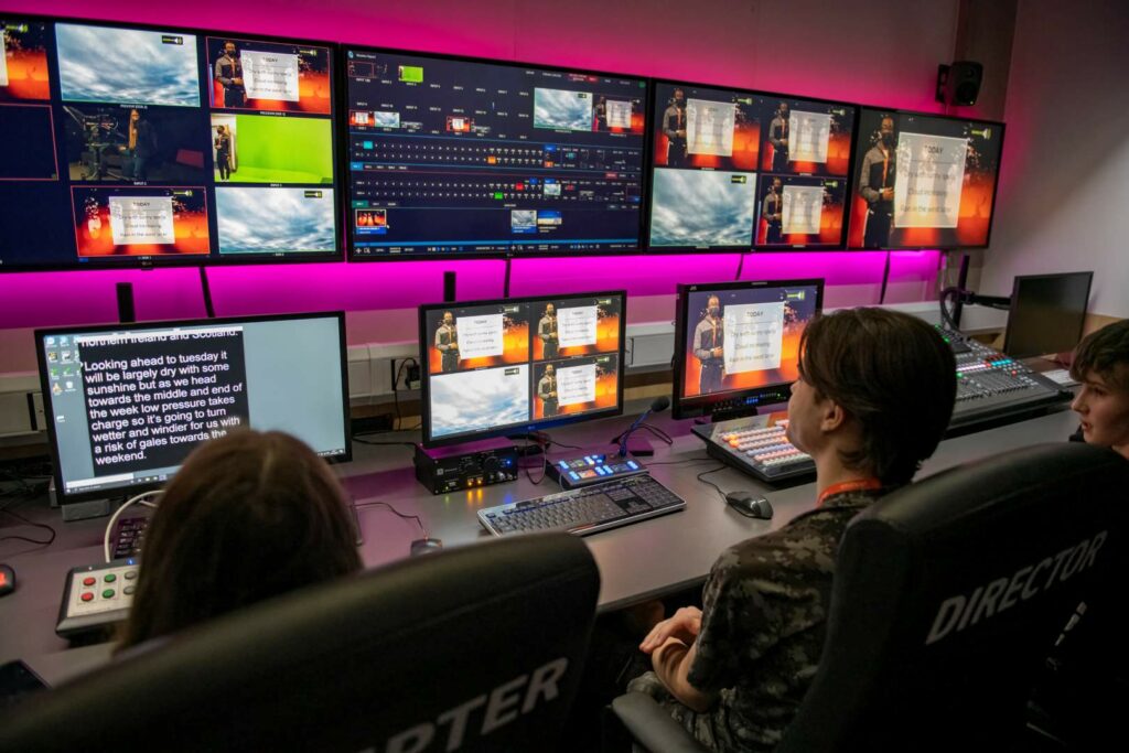 TV Production broadcasting room where students are monitoring all the different camera angels and view ports