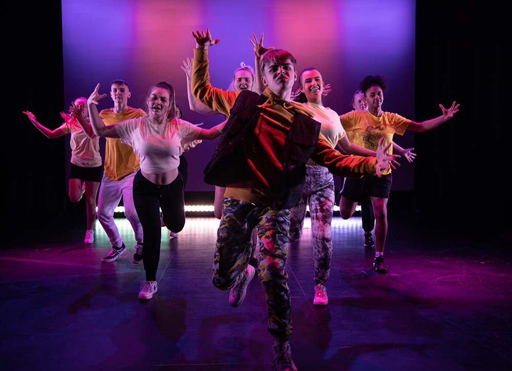 Creative Arts students performing a dance on stage