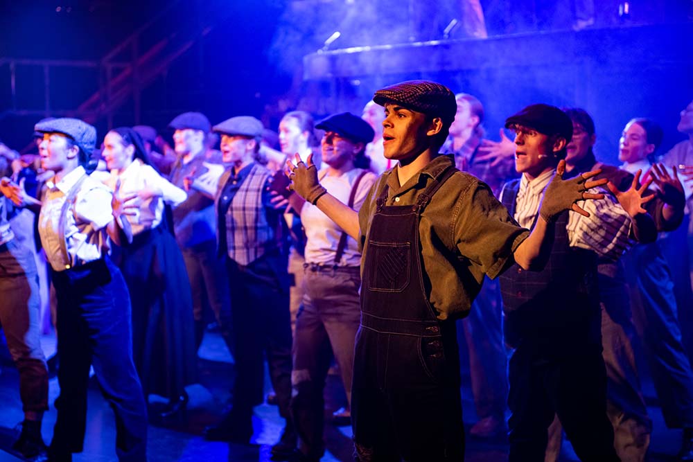 Creative Arts students performing a musical on stage