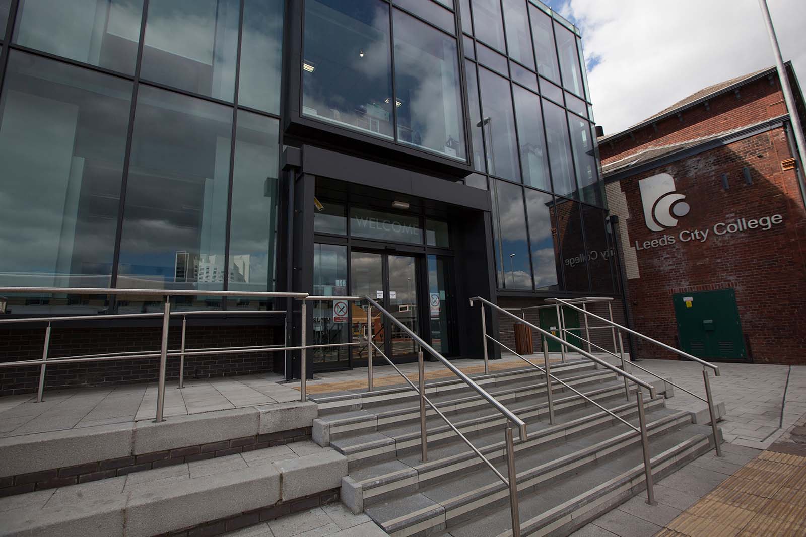 Leeds City College Printworks campus entrance - steps leading up to glass fronted building